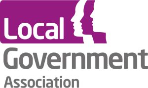 LGA logo with image of faces in purple and white background